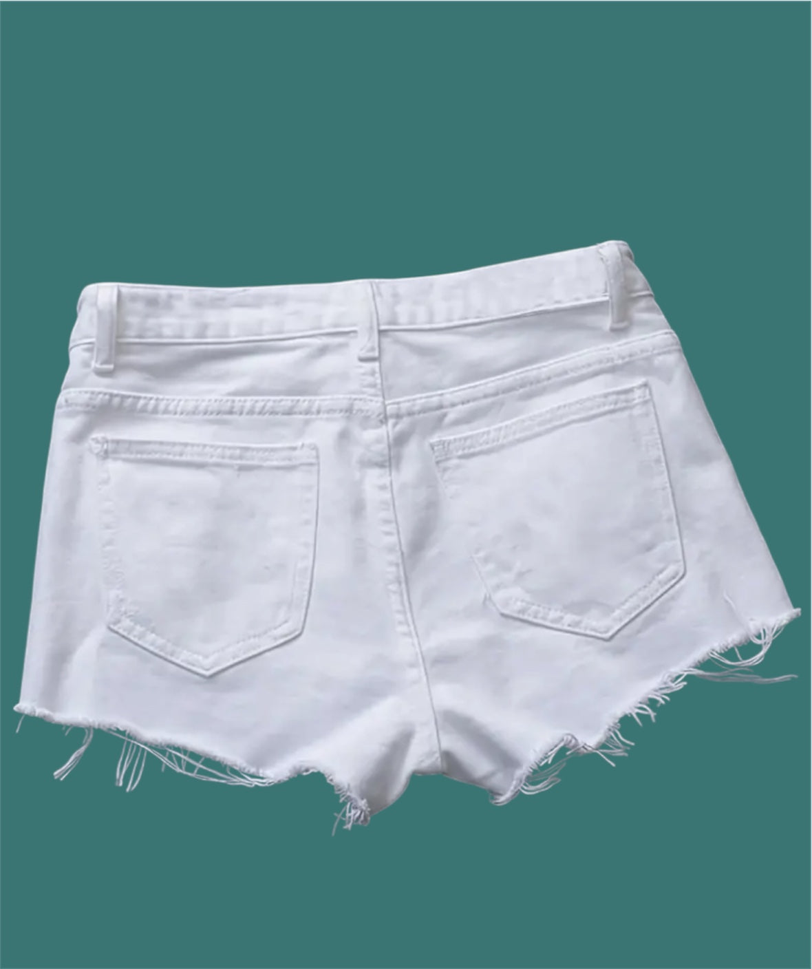 Shorts denim blancos de cintura alta con efecto desgastado